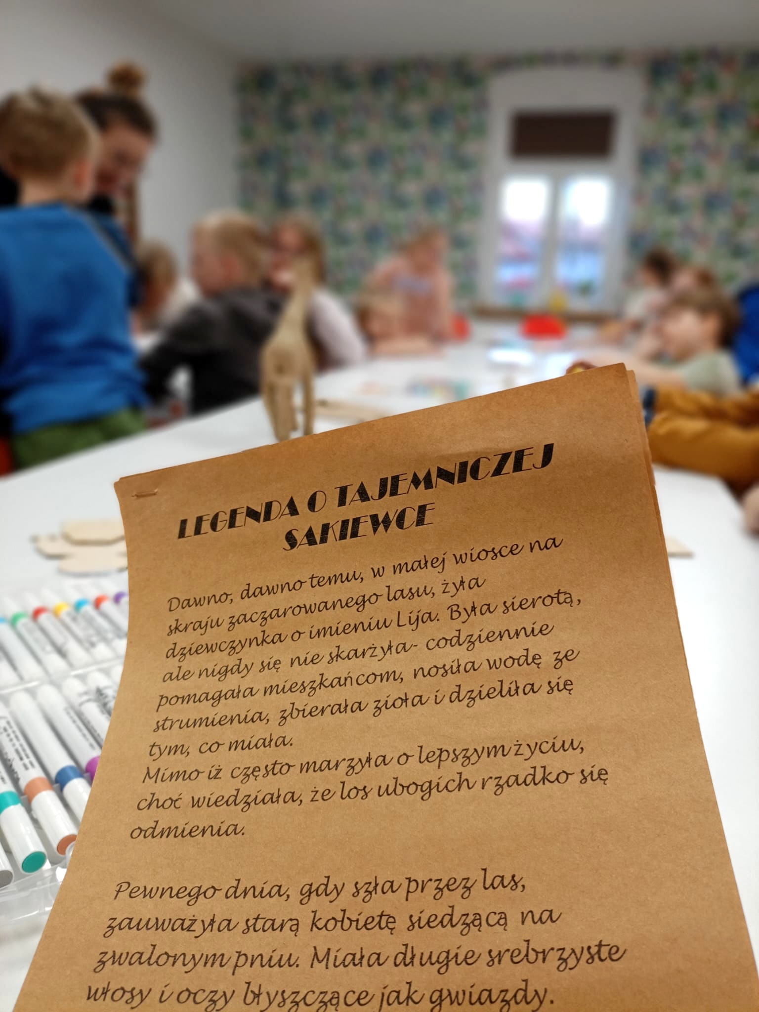 Spisana na brązowej kartce legenda "tajemnicza sakiewka".